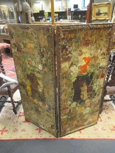 Lot 522 - A two fold decoupage screen, depciting...