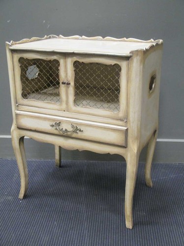 Lot 420 - A silvered night table with grill panelled...
