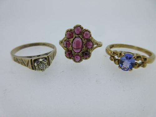 Lot 182 - Three hallmarked gold and gemset rings