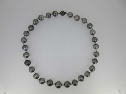 Lot 253 - A Tahitian pearl and aquamarine necklace with fancy coloured diamond clasp