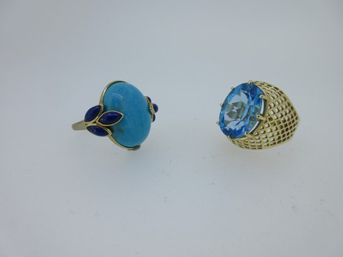 Lot 154 - Two gold and vivid blue gemset dress rings