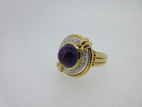 Lot 138 - A modern amethyst and diamond ring
