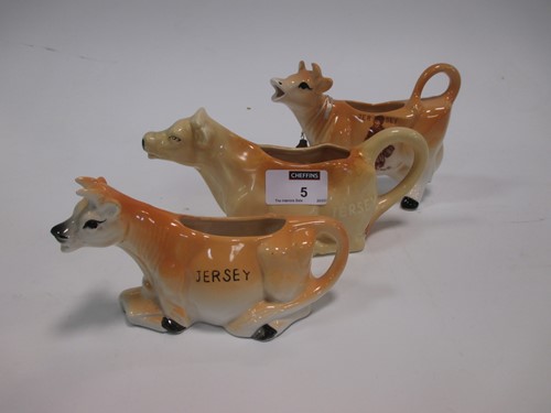 Lot 5 - A collection of 20th century cow creamers, a...