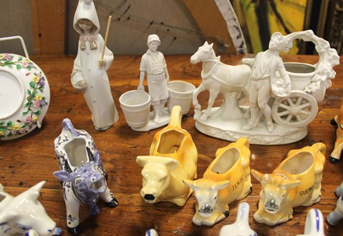 Lot 5 - A collection of 20th century cow creamers, a...