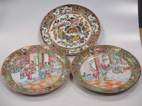 Lot 30 - Two Cantonese famille rose plates and another...