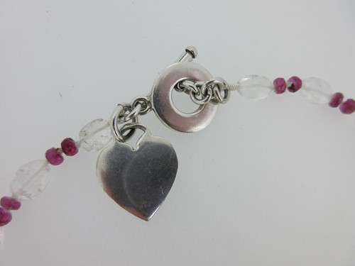 Lot 242 - A rock crystal and red tourmaline necklace