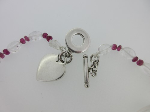 Lot 242 - A rock crystal and red tourmaline necklace