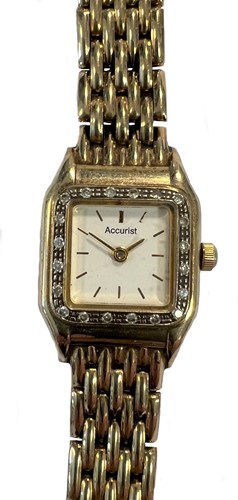 Lot 314 - Accurist - A 9ct gold and diamond set wristwatch