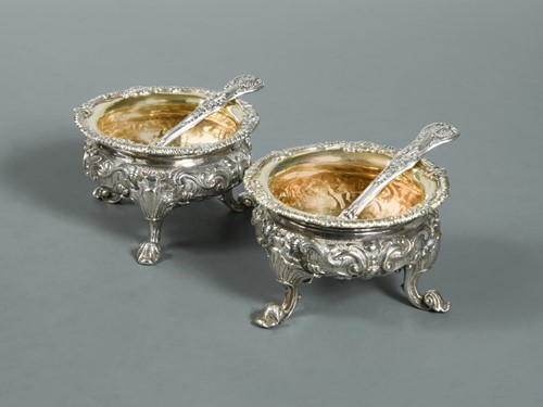 Lot 530 - A pair of George IV silver cast salts and accompanying spoons