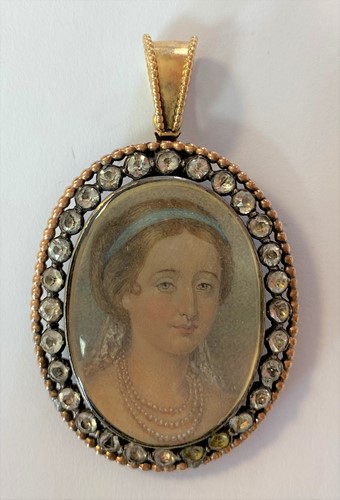 Lot 207 - A miniature portrait of the Empress Eugénie set in a double sided pendant