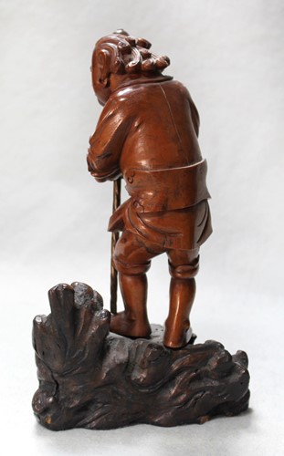 Lot 82 - An Asian carving of a boy, late 19th century