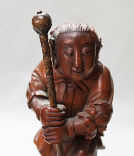 Lot 82 - An Asian carving of a boy, late 19th century