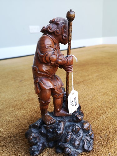 Lot 82 - An Asian carving of a boy, late 19th century