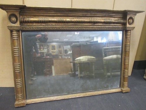 Lot 395 - A Regency giltwood overmantle with cluster...