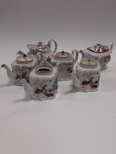 Lot 46 - A collection of 12 English porcelain teapots...