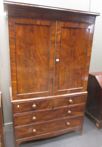 Lot 341 - A 19th century mahogany linen press, 210 x 126