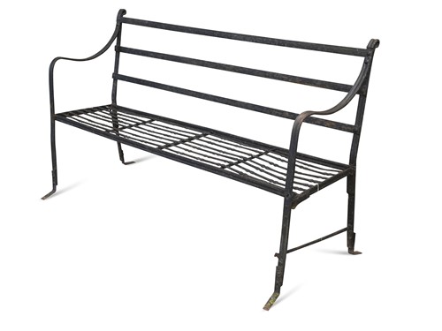 Lot 645 - A Regency wrought iron strap work garden bench
