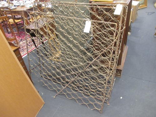 Lot 385 - Two similar vintage wine racks, some rust and...