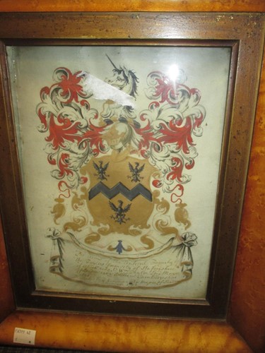 Lot 181 - A painted Taylor family armorial crest...