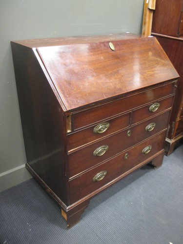 Lot 342 - A George III mahogany bureau, with fitted...