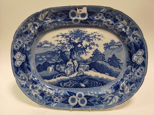 Lot 59 - A 19th century blue and white meat plate,...