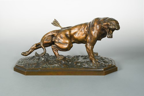 Lot 87 - Thomas François Cartier (French, 1879–1943), a bronze of a wounded Tiger