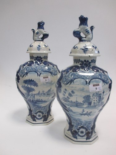 Lot 9 - A pair of traditional design Delft painted...