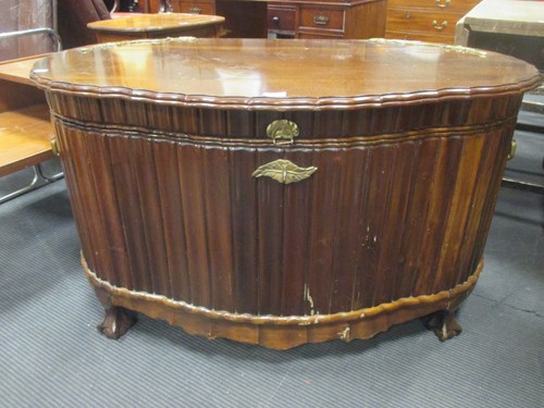 Lot 365 - A mid 20th century mahogany coffer, the oval...