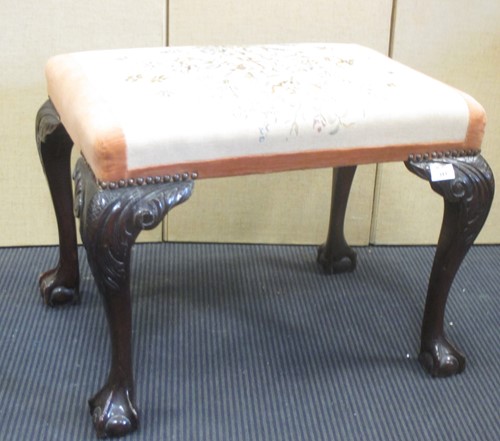 Lot 311 - A Victorian mahogany stool on leaf carved legs...