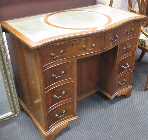 Lot 359 - A Regency style mahogany kneehole desk with...