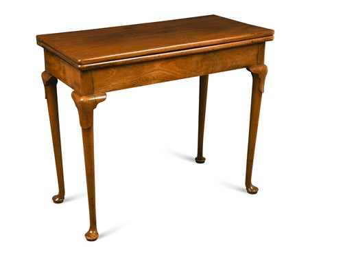 Lot 566 - A late George II mahogany fold-over tea table