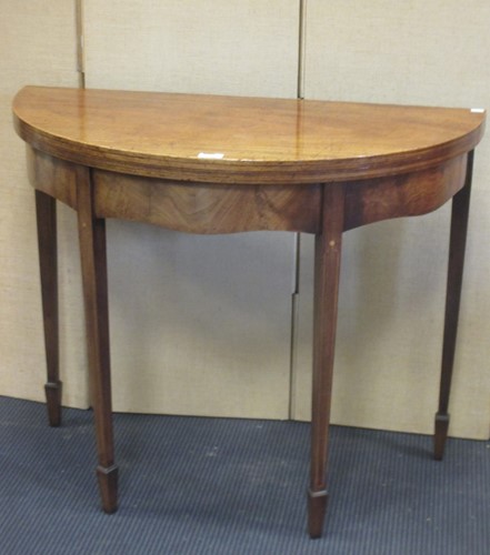Lot 322 - A Regency mahogany fold-over D-shaped tea...