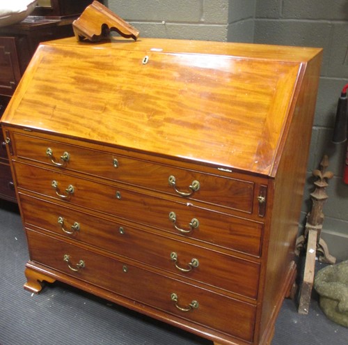 Lot 369 - A George III mahogany bureau with fitted...