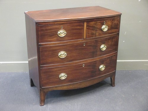 Lot 300 - An early 19th century mahogany bowfront small...