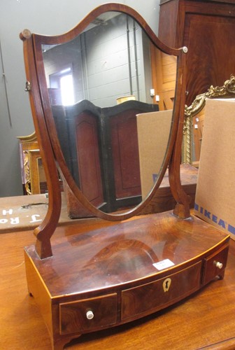 Lot 347 - A Regency mahogany shield shaped toilet mirror;...