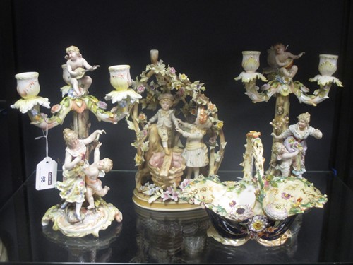 Lot 68 - A pair of German porcelain three branch...