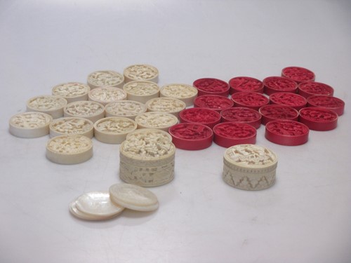Lot 92 - A set of Chinese carved ivory playing pieces,...