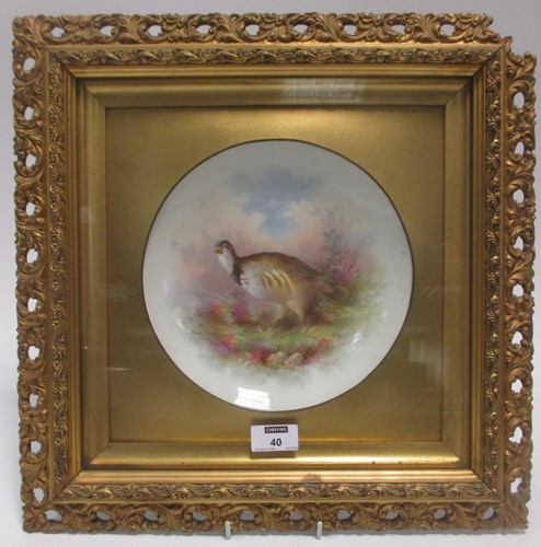 Lot 40 - A late 19th century display plate hand painted...