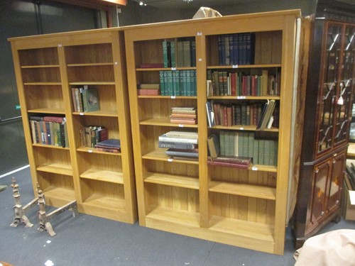 Lot 367 - A pair of modern pale oak open bookcases,...