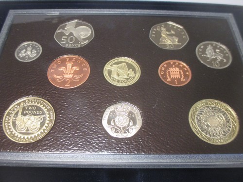 Lot 94 - 2004 UK coin collection £2-1p; together with...