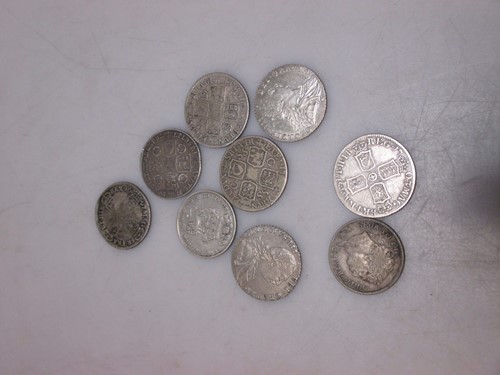 Lot 81 - Nine silver shillings, 1739, 1723, 1787 (x2),...