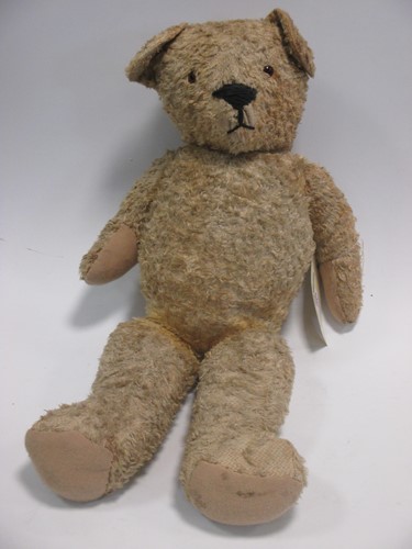 Lot 111 - A large early 20th century teddy with growling...