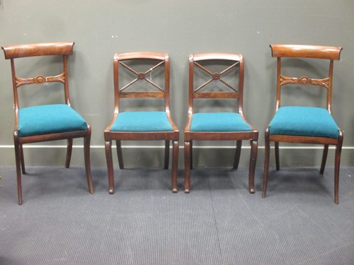 Lot 442 - A pair of Regency sabre leg dining chairs;...