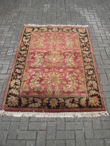 Lot 764 - An old Caucasian rug; together with another...
