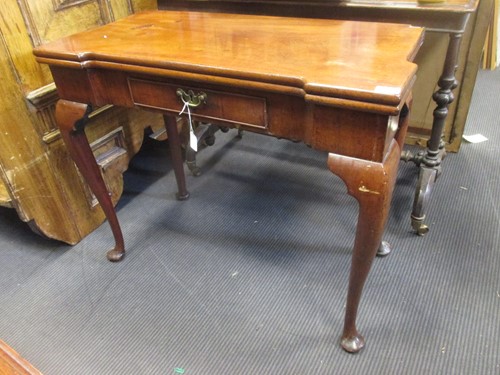 Lot 410 - A Georgian red walnut or mahogany fold over...