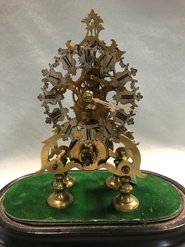 Lot 25 - A Victorian brass skeleton timepiece