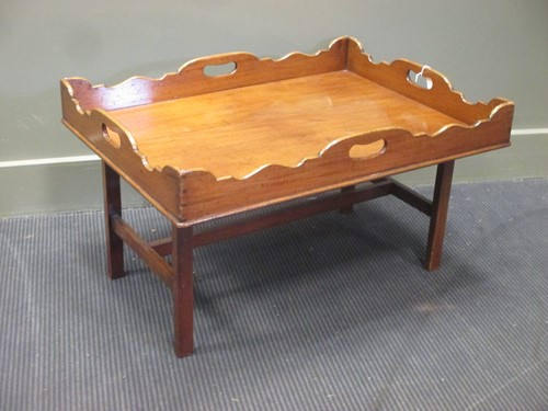 Lot 494 - A rectangular Georgian mahogany butler's tray...