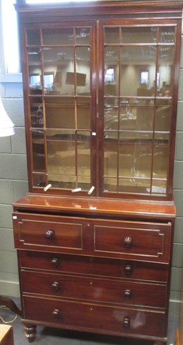 Lot 370 - A 19th century mahogany secretaire bookcase...