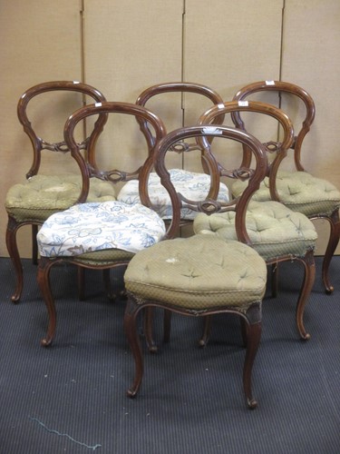 Lot 310 - Six Victorian walnut balloon back dining chairs