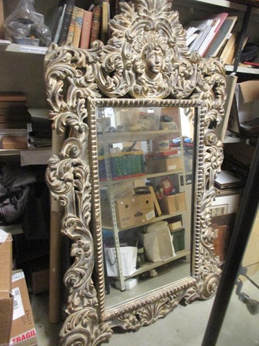 Lot 362 - A Baroque style carved gilt wood framed wall...